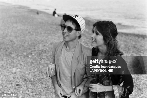 Portrait du musicien Paul Simon et de l'actrice Carrie Fisher le 20 septembre 1983