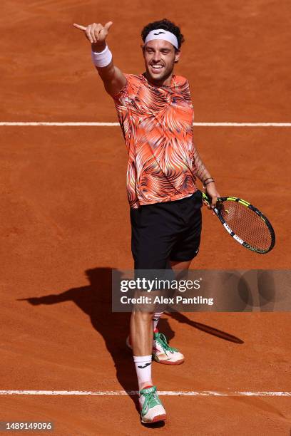 Marco Cecchinato of Italy celebrates victory against Mackenzie McDonald of the United States during the Men's Singles First Round match on Day Four...