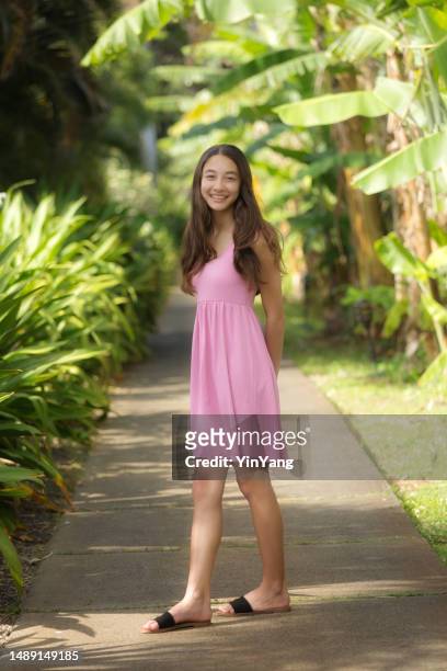 casual portrait of young hawaiian teenage adolescent girl - polynesia stock pictures, royalty-free photos & images