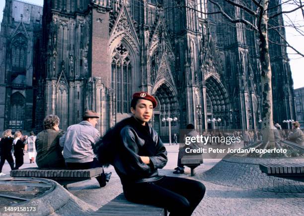 Nigerian born British singer Sade Adu posed in front of the entance to Cologne Cathedral during a tour of West Germany in March 1986.