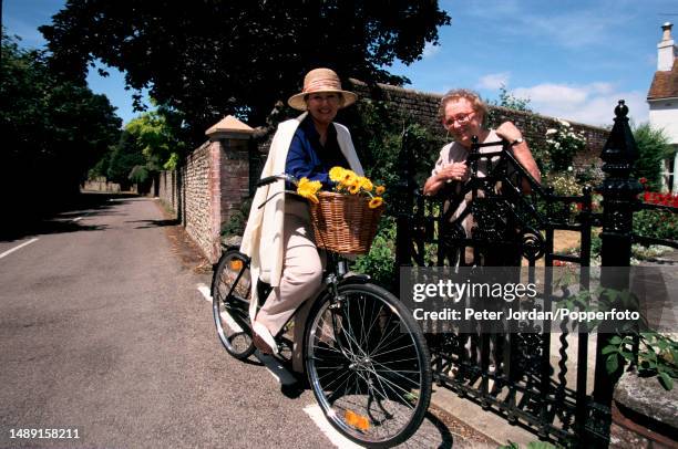 English actress Thora Hird with her daughter, actress Janette Scott, at the front gate of her house near Chichester in West Sussex, England on 10th...