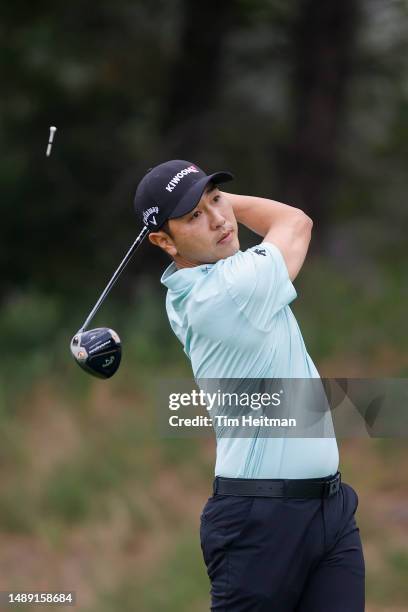 Sang-moon Bae of South Korea plays his shot from the 14th tee during the first round of the AT&T Byron Nelson at TPC Craig Ranch on May 11, 2023 in...