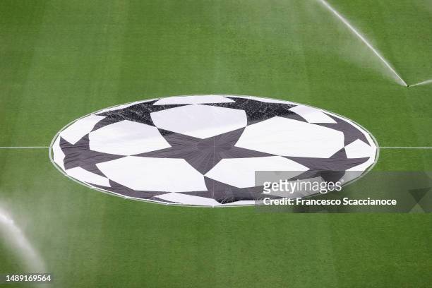 Champions League logo on the pitch during the UEFA Champions League semi-final first leg match between AC Milan and FC Internazionale at San Siro on...