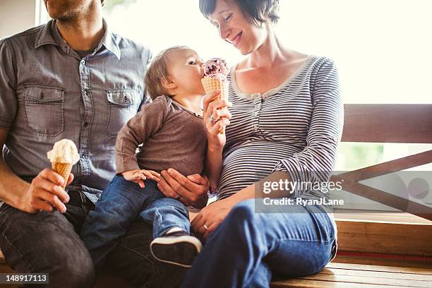 family at ice cream shop - icecream stock pictures, royalty-free photos & images