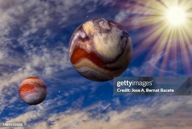 deep outer space with bright stars and a strange planets with a liquid atmosphere. - jupiter planet stock pictures, royalty-free photos & images
