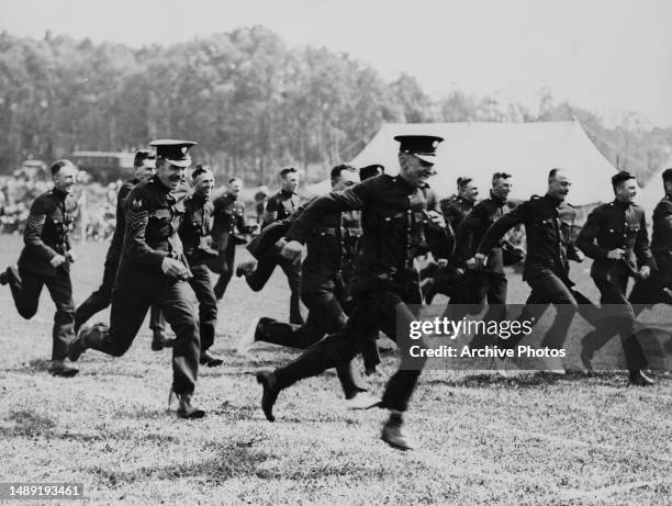 The Grenadier Guards take a break during a sports event, Aldershot, Surrey, Circa 1918.