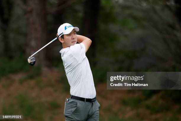 Seung-yul Noh of South Korea plays his shot from the 14th tee during the first round of the AT&T Byron Nelson at TPC Craig Ranch on May 11, 2023 in...