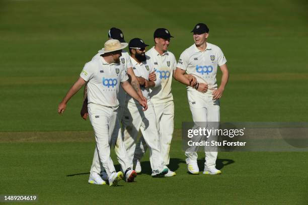 Durham bowler Matthew Potts and debutants Bas de Leede and Ajaz Patel with Brydon Carse and Ben Raine, walk off arm in arm after in bowling Yorkshire...