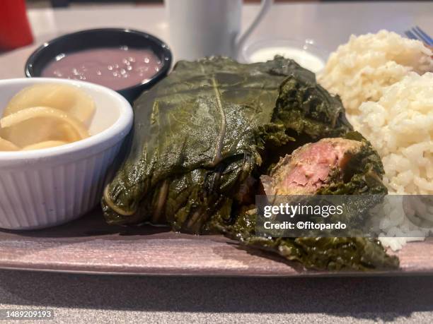 hawaiian food platter with laulau, poi and pork - pork pie stock pictures, royalty-free photos & images