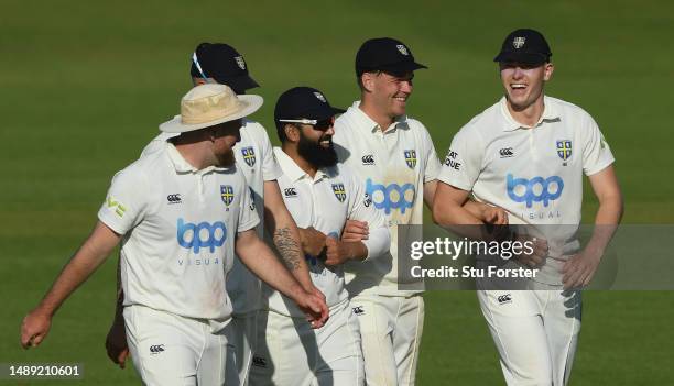 Durham bowler Matthew Potts and debutants Bas de Leede and Ajaz Patel with Brydon Carse and Ben Raine, walk off arm in arm after in bowling Yorkshire...