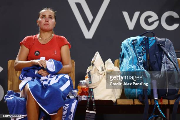Sofia Kenin of the United States looks on as they sit on a bench during a break against Aryna Sabalenka during the Women's Singles Second Round match...