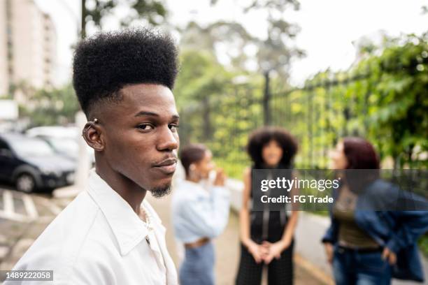 portrait of a young man in the street - blank face stock pictures, royalty-free photos & images