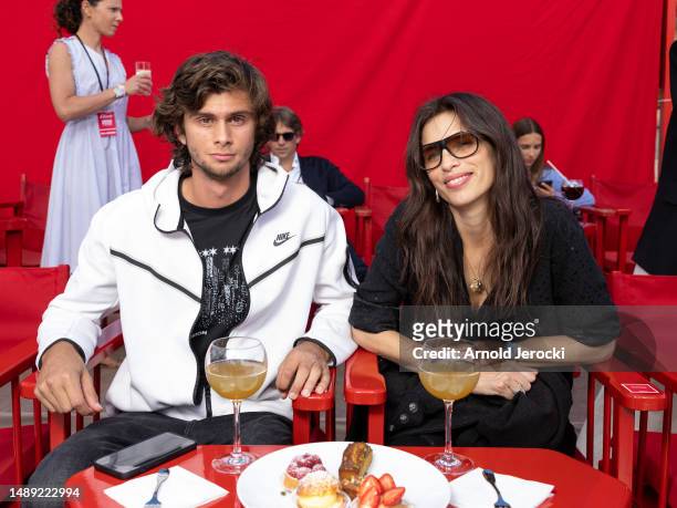 Diego Le Fur and Maïwenn attends the ETAM Cruise 2023 Show on May 11, 2023 in Saint-Tropez, France.