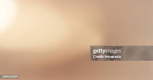 golden gradient light beam defocused background - orange silk background stock pictures, royalty-free photos & images