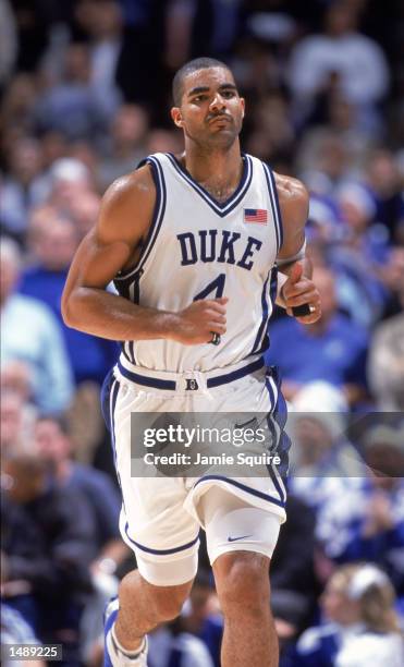 Carlos Boozer of the Duke Blue Devils runs down the court during the college basketball game against the Kentucky Wildcats, part of the Jimmy V...