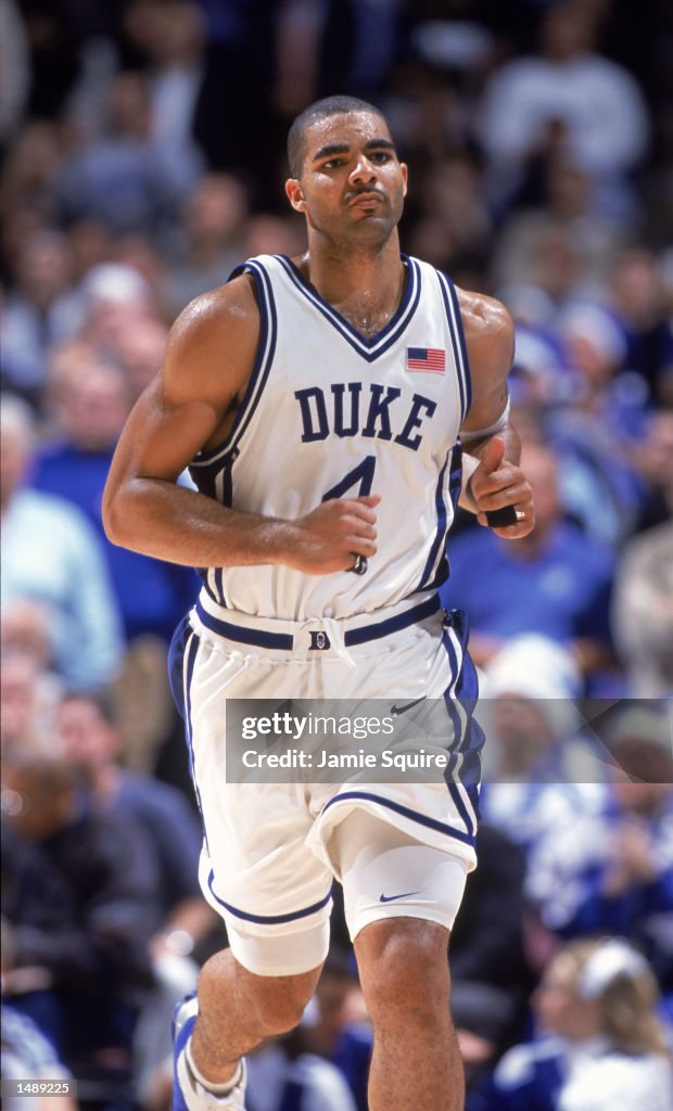Carlos Boozer runs down the court