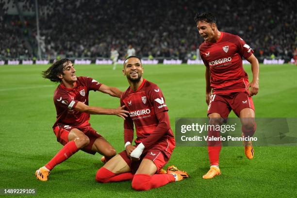 Yousseff En-Nesyri of Sevilla FC celebrates after scoring the team's first goal with teammates Bryan Gil and Oliver Torres during the UEFA Europa...