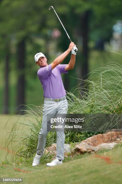 Steve Stricker of the United States plays a shot from the rough on the 18th hole during the first round of the Regions Tradition at Greystone Golf...