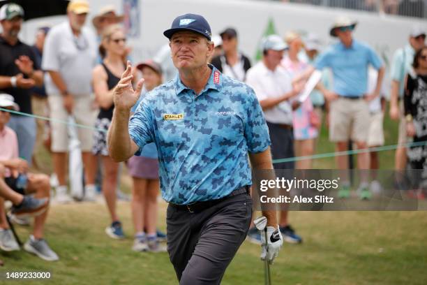 Ernie Els of South Africa reacts after chipping onto the 18th green during the first round of the Regions Tradition at Greystone Golf and Country...