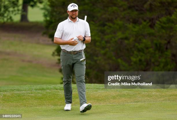 Brice Garnett of the United States walks the fifth hole during the first round of the AT&T Byron Nelson at TPC Craig Ranch on May 11, 2023 in...