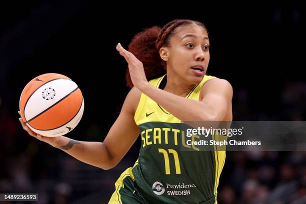 Arella Guirantes of the Seattle Storm dribbles against the Phoenix Mercury during the fourth quarter in a WNBA preseason game at Climate Pledge Arena...