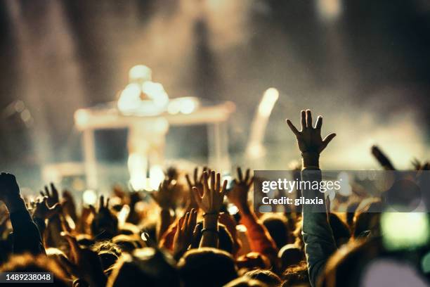 large group of people at a concert party. - performance stock pictures, royalty-free photos & images