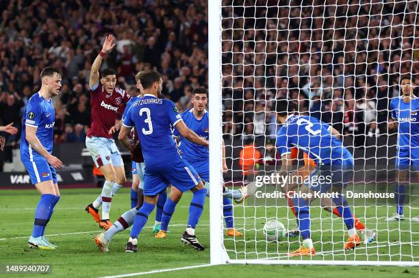 Michail Antonio of West Ham United scores their teams second goal during the UEFA Europa Conference League semi-final first leg match between West...