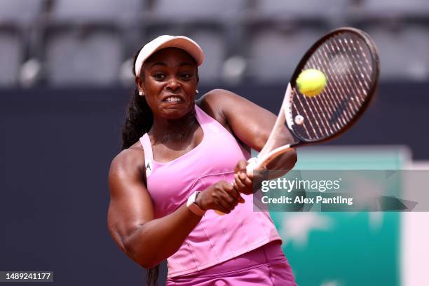 Sloane Stephens of The United States plays a backhand in her women's singles second round match against Victoria Azarenka during day four of the...