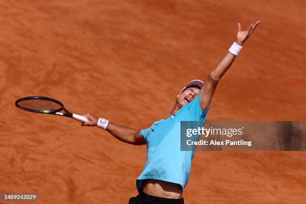 Mackenzie McDonald of the United States serves against against Marco Cecchinato of Italy during the Men's Singles First Round match on Day Four at...