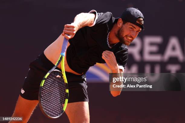 Maxime Cressy of The United States serves in his men's singles first round match against Guido Pella of Argentina during day four of the...