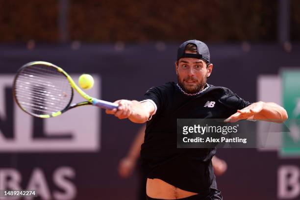 Maxime Cressy of The United States plays a forehand in his men's singles first round match against Guido Pella of Argentina during day four of the...