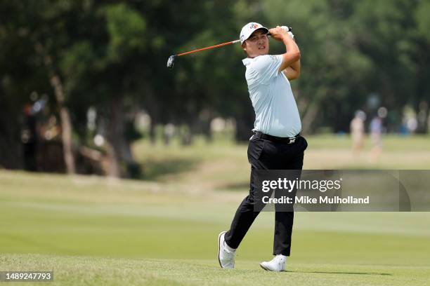 Kyoung-Hoon Lee of South Korea plays an approach on the ninth hole during the first round of the AT&T Byron Nelson at TPC Craig Ranch on May 11, 2023...