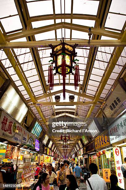 snake alley or taipei hwahsi (huaxi) tourist night market. - snake alley stock pictures, royalty-free photos & images