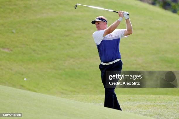 Paul Broadhurst of England hits from the ninth fairway during the first round of the Regions Tradition at Greystone Golf and Country Club on May 11,...