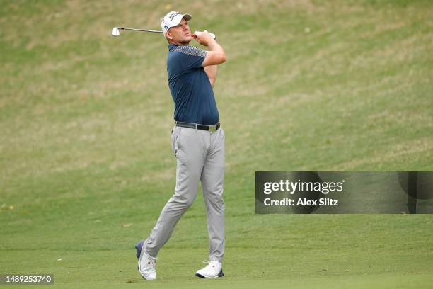 Robert Karlsson of Sweden watches his shot from the third fairway during the first round of the Regions Tradition at Greystone Golf and Country Club...