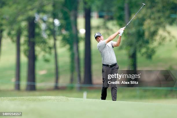 Jerry Kelly of the United States plays a shot on the 18th fairway during the first round of the Regions Tradition at Greystone Golf and Country Club...