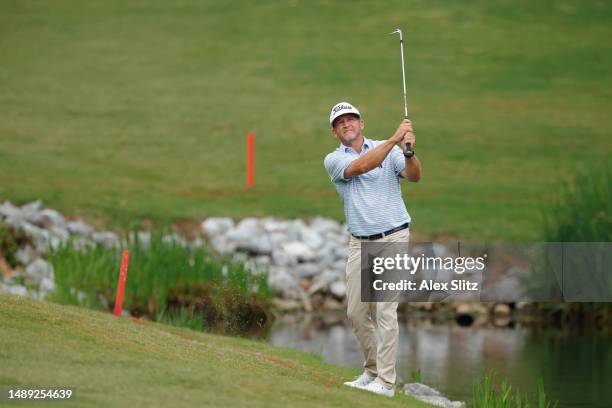 Jason Bohn of the United States watches his shot from the rough on the second hole during the first round of the Regions Tradition at Greystone Golf...