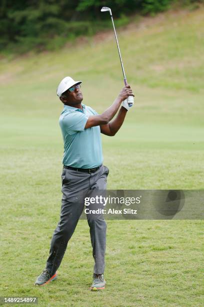 Vijay Signh of Fiji watches his shot on the third fairway during the first round of the Regions Tradition at Greystone Golf and Country Club on May...