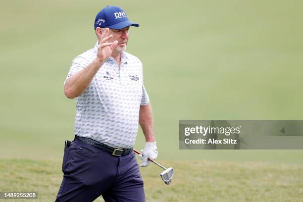 Rod Pampling of Australia celebrates after putting for birdie on the second hole during the first round of the Regions Tradition at Greystone Golf...