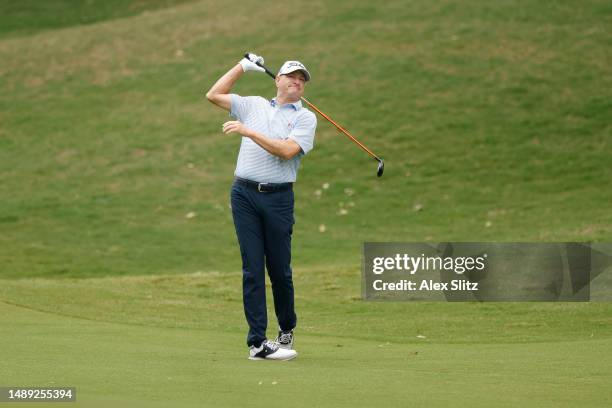 Steve Flesch of the United States watches his shot on the second fairway during the first round of the Regions Tradition at Greystone Golf and...