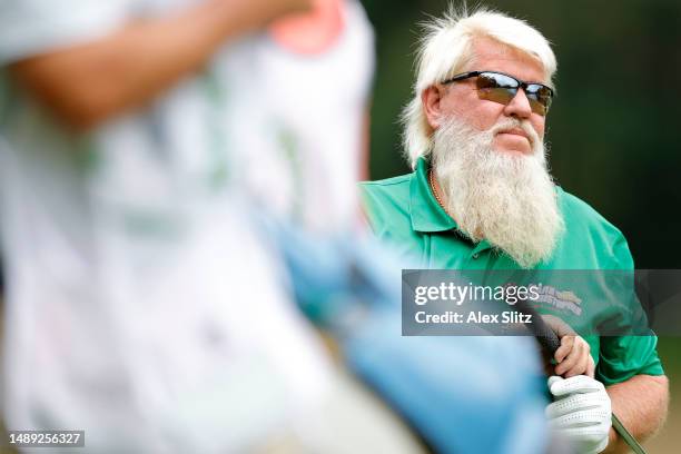 John Daly of the United states waits to tee off on the fourth hole during the first round of the Regions Tradition at Greystone Golf and Country Club...