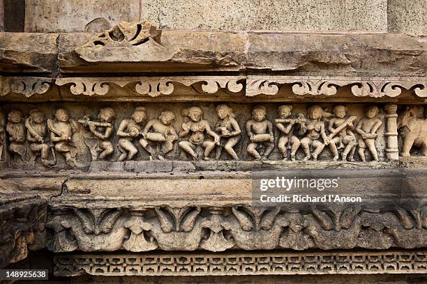 stone carvings on lakshmana temple. - khajuraho stock pictures, royalty-free photos & images