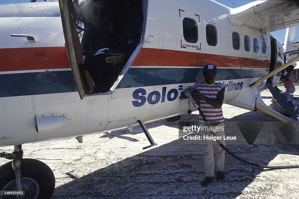 Refuelling Solomon Airlines Twin Otter aircraft.