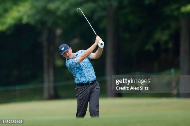 Ernie Els of South Africa plays a shot on the 18th hole during the first round of the Regions Tradition at Greystone Golf and Country Club on May 11,...