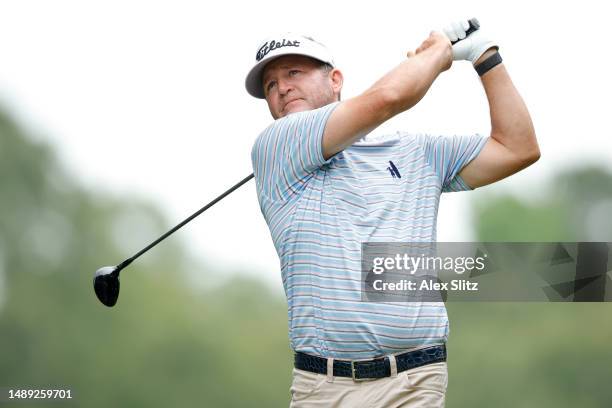 Jason Bohn of the United States hits a tee shot on the third hole during the first round of the Regions Tradition at Greystone Golf and Country Club...