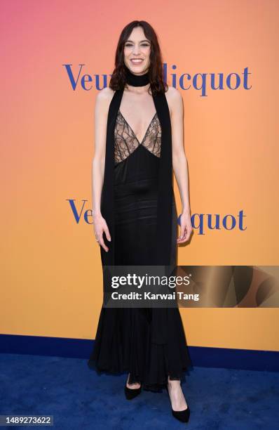 Alexa Chung attends the exhibition opening of Veuve Clicquot's SOLAIRE CULTURE at Regent Street on May 11, 2023 in London, England.