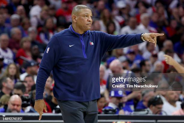 Head Coach Doc Rivers of the Philadelphia 76ers points against the Boston Celtics during the first quarter in game six of the Eastern Conference...
