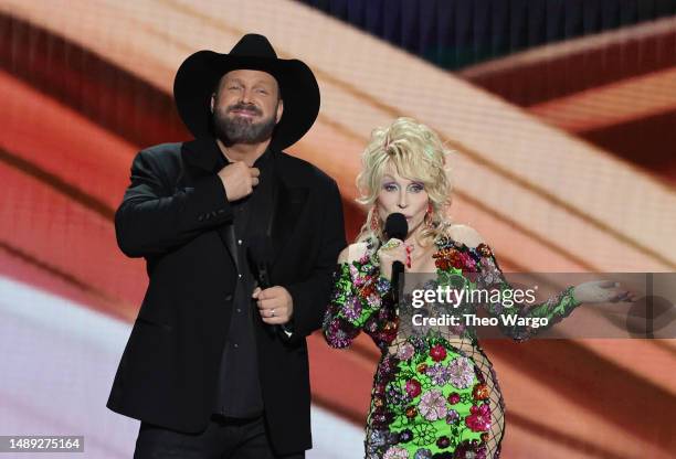 Co-hosts Garth Brooks and Dolly Parton speak onstage during the 58th Academy Of Country Music Awards at The Ford Center at The Star on May 11, 2023...