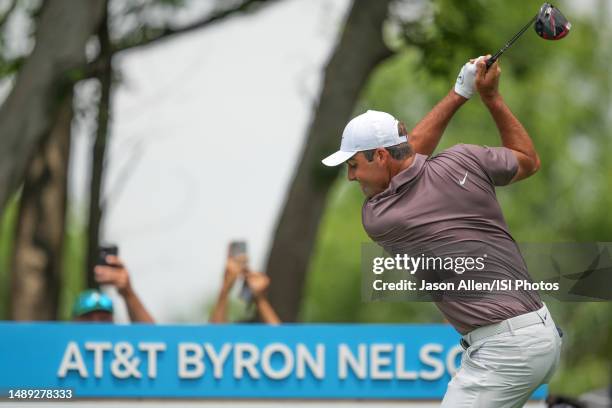 Scottie Scheffler of the United States hits his tee shot from hole during the first round of the AT&T Byron Nelson at TPC Craig Ranch on May 11, 2023...