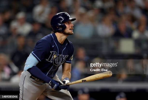 Josh Lowe of the Tampa Bay Rays hits a 3 RBI double in the sixth inning against the New York Yankees at Yankee Stadium on May 11, 2023 in Bronx...